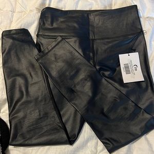 Brand New Zyia Active Black Metallic light and tight leggings